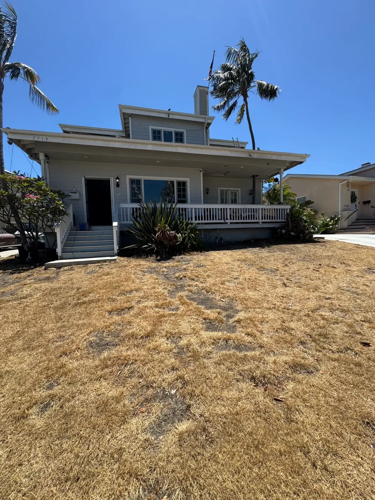 Dry, patchy lawn before work began
